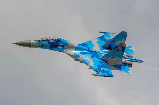 RADOM, POLAND - AUGUST 25: Ukrainian SU-27 display during Air Show 2013 event on August 25, 2013 in Radom, Poland