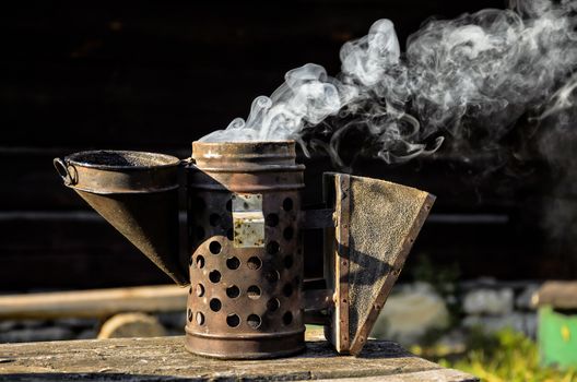 Antique bee smoker