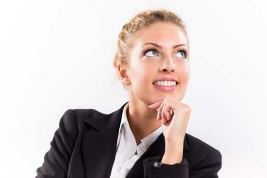 Portrait of attractive businesswoman thinking.