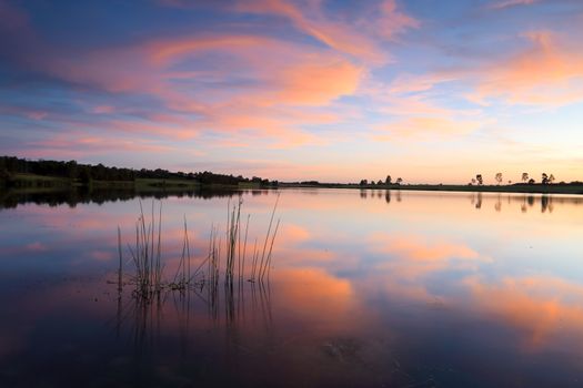 Sensational sunset over Duralia Lake, Penrith Lakes, Australia