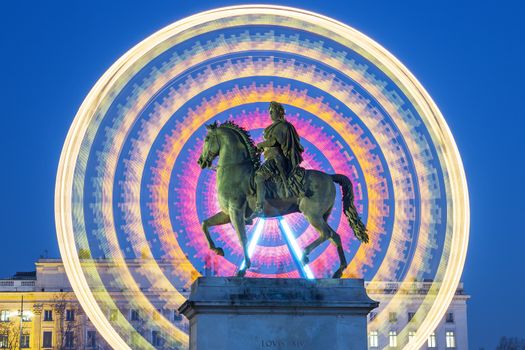 Statue of Louis XIV and wheel by night, Lyon, France