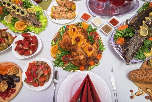 Lots of traditional festive food on table. Christmas table.