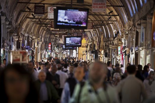 ISTANBUL, TURKEY – APRIL 26: Inside the busy Grand Bazaar in Istanbul with tourists and local Turkish people prior to Anzac Day on April 26, 2012 in Istanbul, Turkey. 