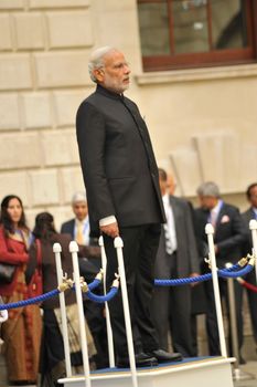 UK, London: Indian Prime Minister Narendra Modi looks on during an honor guard procession on Whitehall for his arrival in London on November 12, 2015. His three-day visit marks the first by an Indian Prime Minister in more than a decade.