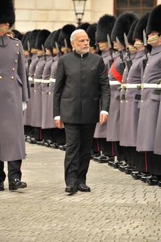 UK, London: Indian Prime Minister Narendra Modi greets an honor guard on Whitehall shortly after his arrival in London on November 12, 2015. Modi's three-day visit marks the first by an Indian Prime Minister in more than a decade.