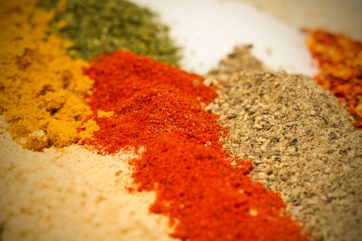 various spices spill on the table