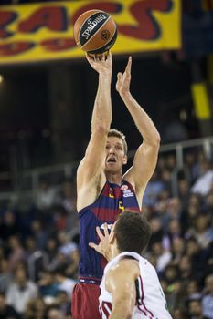 SPAIN, Barcelona: Barcelona Lassa fought it out until the very last moment against Lokomotiv Kuban, winning 72-68 in the Euroleague match at the Palau Blaugrana stadium in Barcelona on November 12, 2015. Barcelona's Justin Doellman in action.