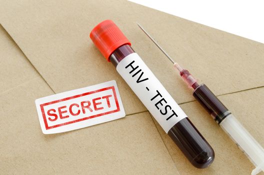 Sample blood collection tube with HIV test label on brown envelope and and secret result diagnosis.