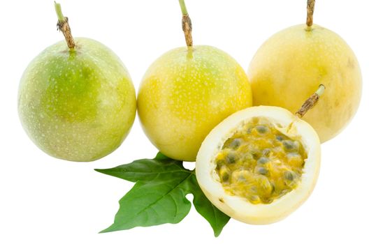 Maracuja, passion fruit and green leaf on white background.
