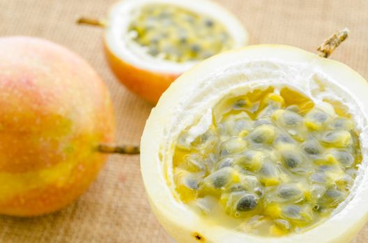 Fresh passion fruit on sack background.