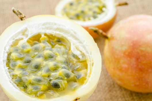 The fresh Passion fruits on sack background.