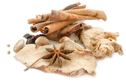 Various spices on a white background