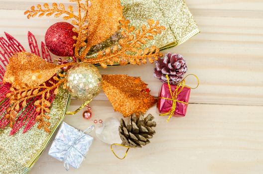 Christmas decoration with presents on wood background.