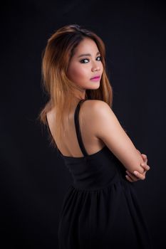 Portrait of young Asian girl - sexy, pretty dress