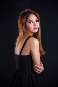 Portrait of young Asian girl - sexy, pretty dress