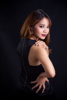 Portrait of young Asian girl - black dress