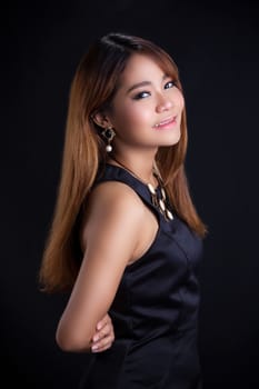 Portrait of young Asian girl - black dress