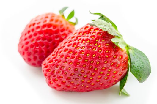 Fresh strawberries on white background.