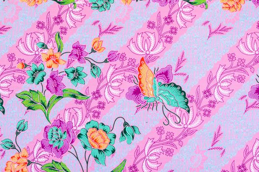 Beautiful flower pattern background on batik fabric