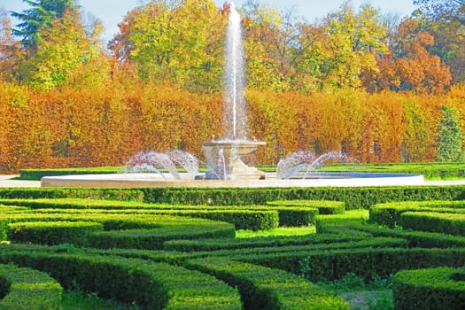 Pretty fountain in the public gardens of the ducal palace of Colorno, Italy, in autumn.