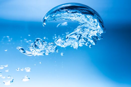macro of big water bubble on clear water for background or backdrop
