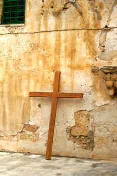 pilgrim with a cross in  jerusalem on the last christ road