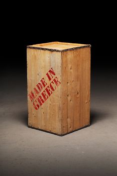 Old wooden crate with text Made in Greece.