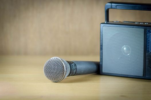 radio and microphone on table old style photo.