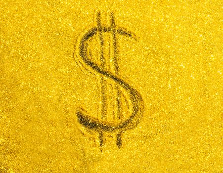 US Dollar symbol on gold color background.