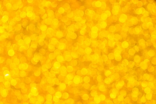 Bokeh gold color abstract background.