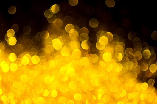 Bokeh gold colour abstract background.