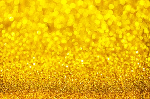 Bokeh gold colour abstract background.