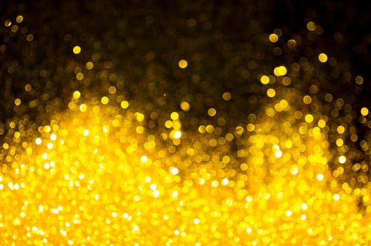 Bokeh gold colour abstract background.