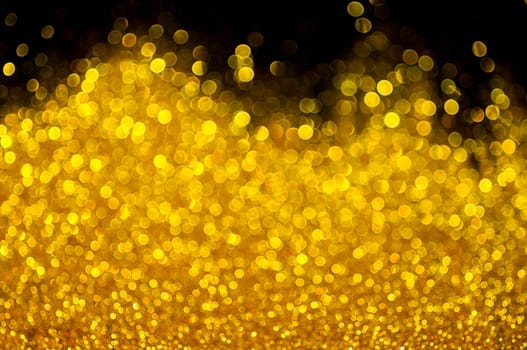 Bokeh gold colour abstract background.