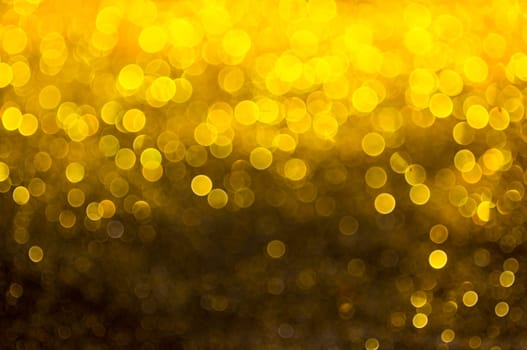 Bokeh gold colour abstract background.