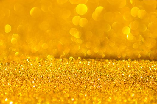 Bokeh gold colour abstract background.