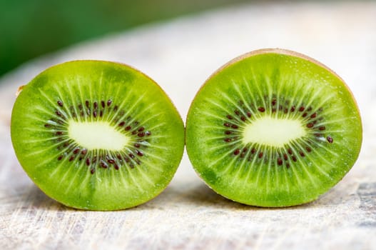 Kiwi fruit on wooden background