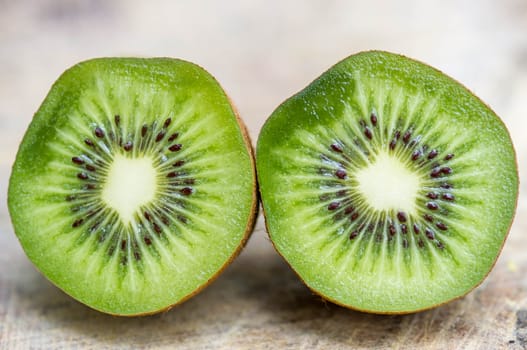 Kiwi fruit on wooden background