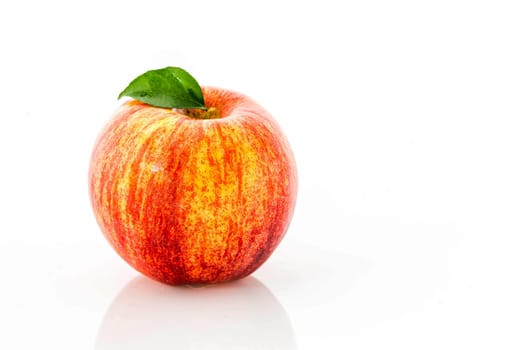 Fresh red apple isolated on a white background.