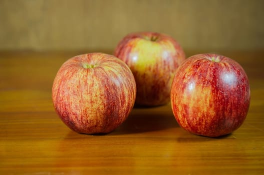 Apples on wooden background