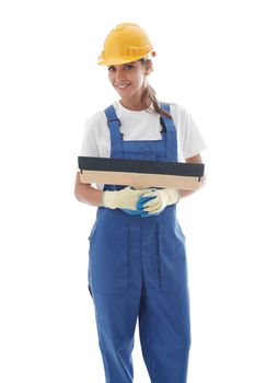 Young beautiful handywoman with masonry trowel isolated on white