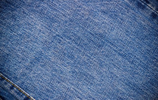 Blue jeans texture. Blue jeans background.