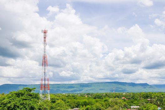 Telecommunication Radio Antenna Tower with blue sky with cloud.