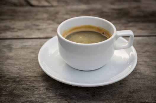 Coffee Espresso. Cup Of Coffee  on wood background.