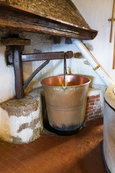 Copper pot under which a fire is lit, used to produce ricotta cheese.