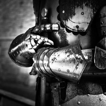 Detail of an old rusty medieval armor.