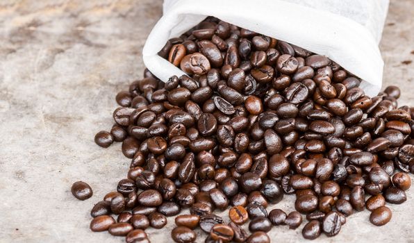 Coffee on grunge wooden background.