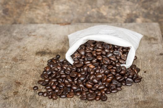 Coffee on grunge wooden background.