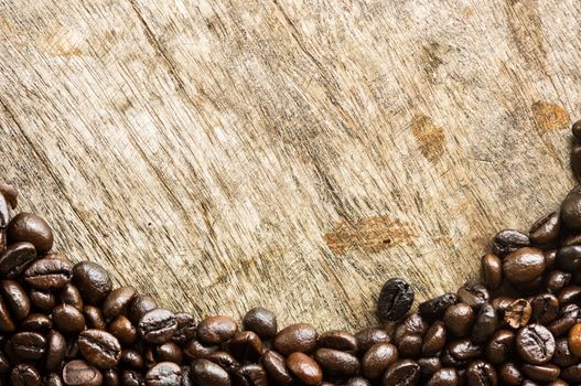 Coffee on grunge wooden background.