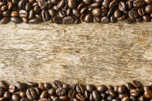 Coffee on grunge wooden background.